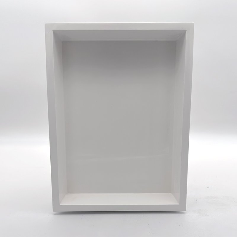 Recessed cultured marble shower niche