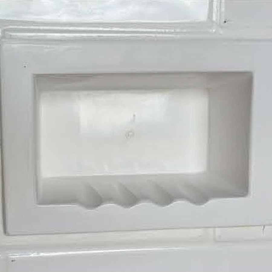 Recessed cultured marble soap niche with a ribbed soap ledge