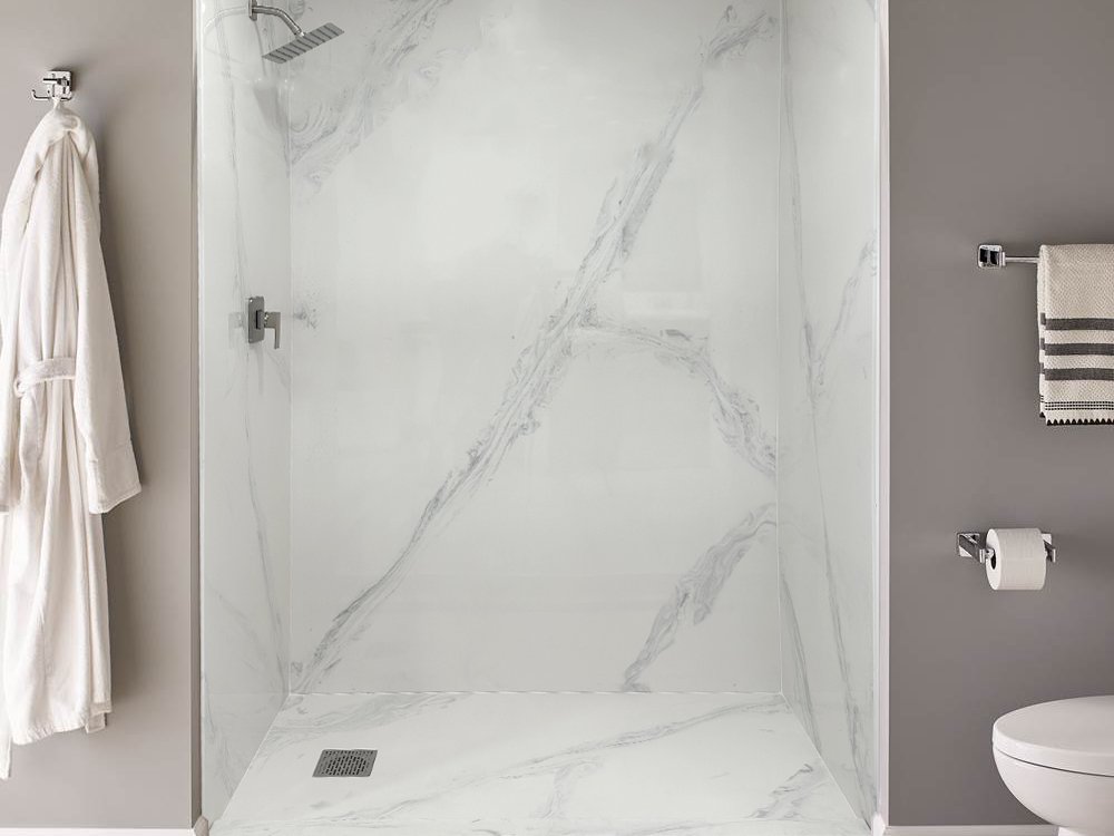 Carrara cultured marble shower enclosure with seamless wall panels