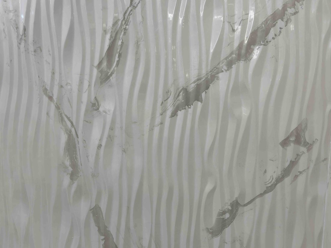Wave-textured cultured marble wall panel